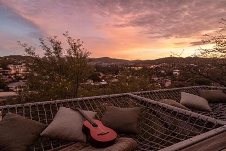 Geniet van de zonsondergang vanaf het terras van je verblijf