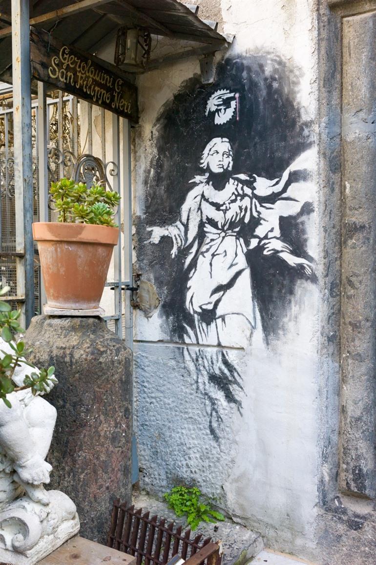 Madonna con la pistola van Banksy, Napels