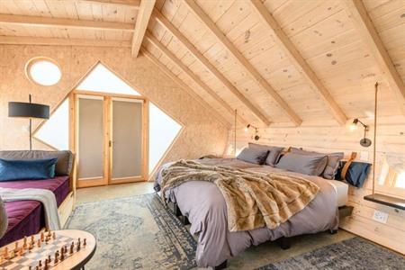 Verblijf in een van de nagebouwde scheepshutten